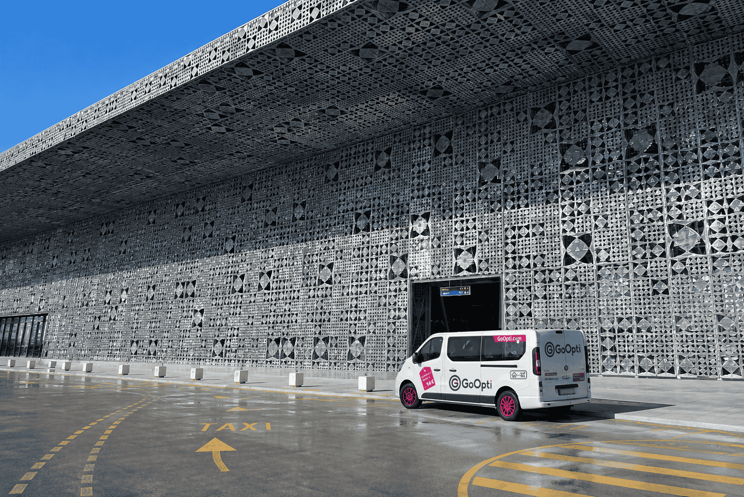 A GoOpti van outside Tirana International Airport Nënë Tereza