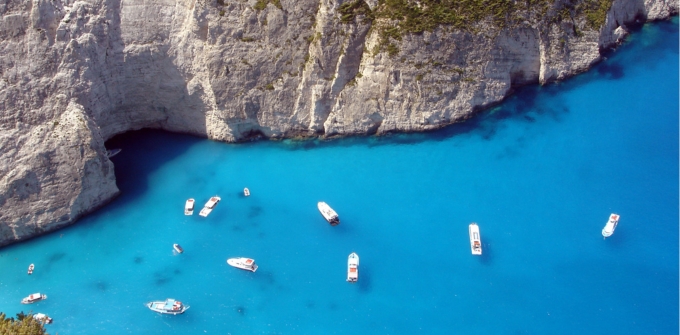 A Greek island cove with turquoise water